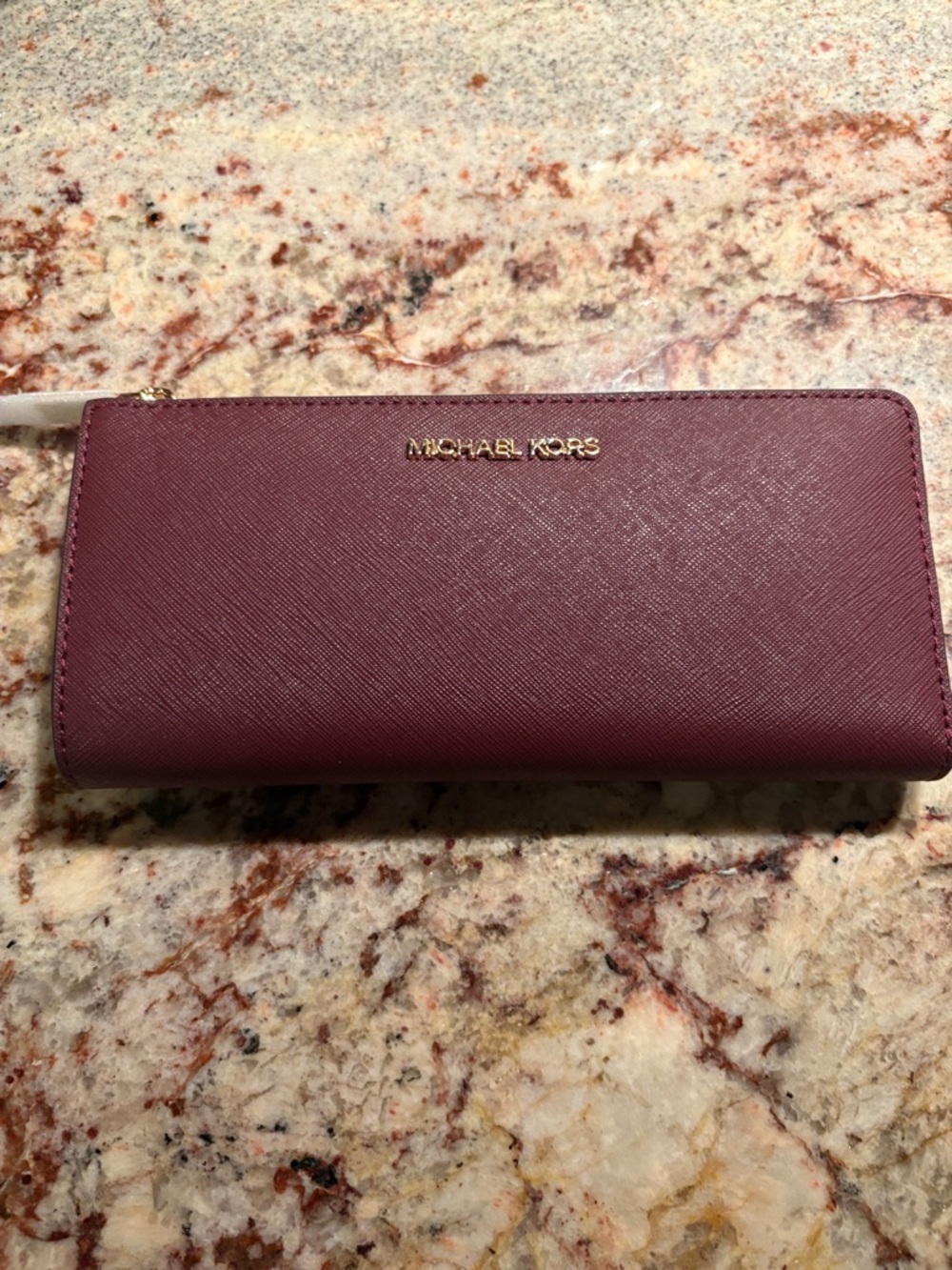 MICHAEL KORS Oxblood Saffiano Zip-Around Wallet with Gold Logo